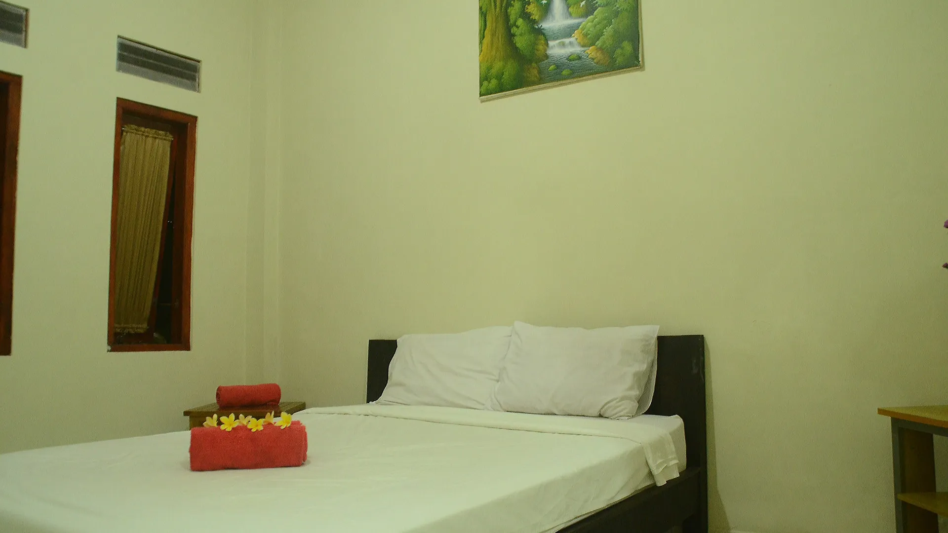 Отель Budget Door Legian Inn Кута